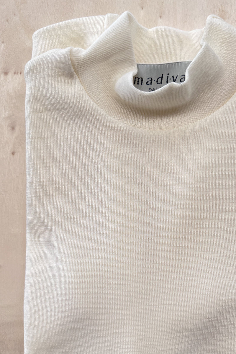 Children's turtleneck sweater Trottola in wool and silk - Gentle on the skin