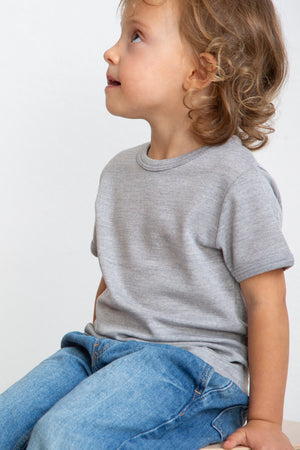 Maglietta intima bambino Trottola in lana e seta - Delicata sulla pelle e mezza manica