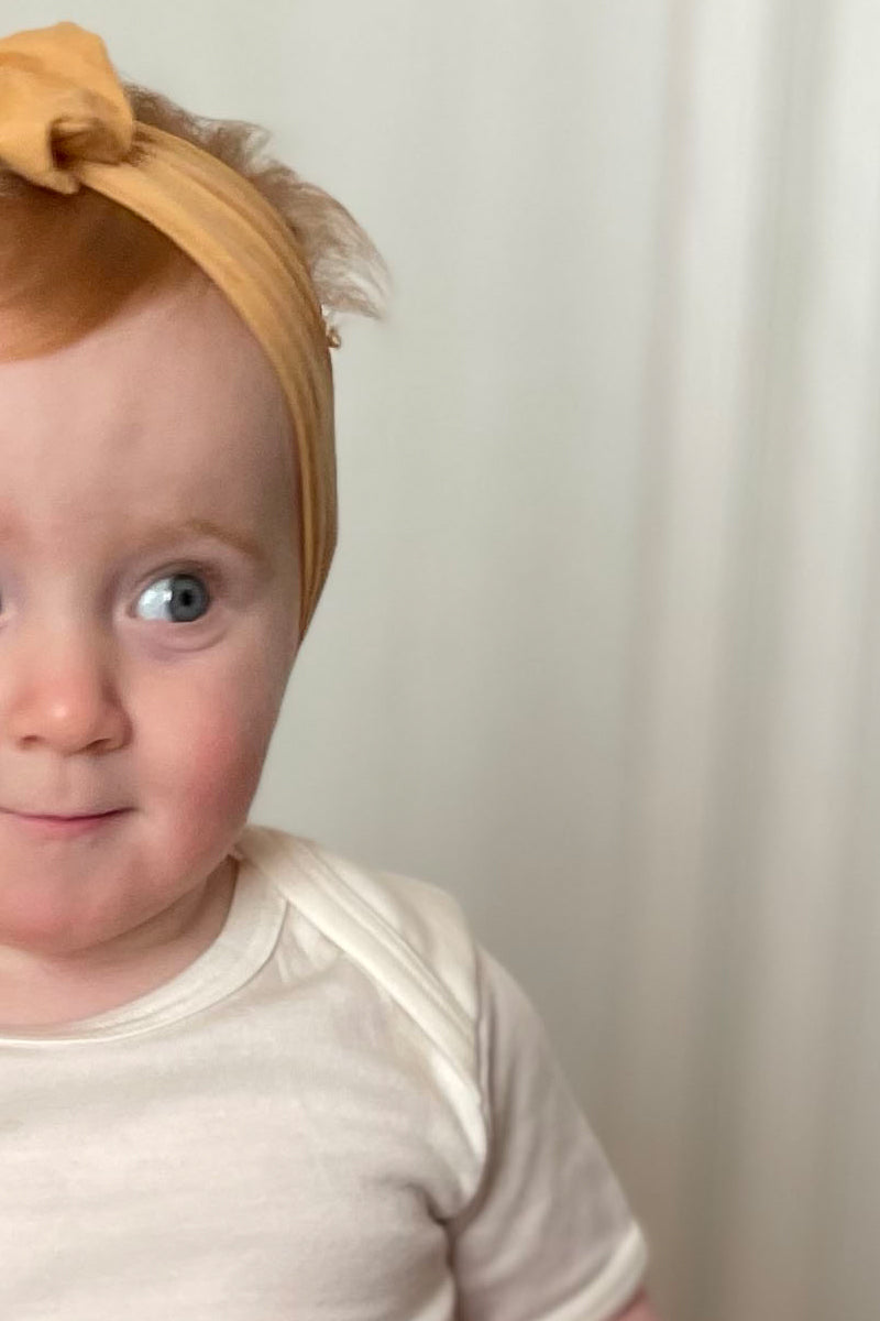 Body neonato Bruco in cotone e lana seta - Mezza manica e delicato sulla pelle